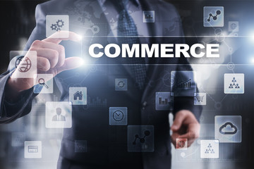 Fototapeta na wymiar Businessman selecting commerce on virtual screen.