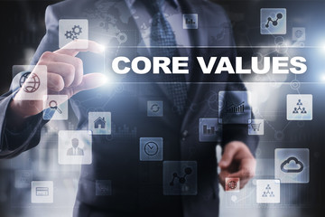 Fototapeta na wymiar Businessman selecting core values on virtual screen.