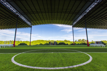 Fototapeta premium Football field Small, Futsal ball field in the gym indoor, Soccer sport field outdoor park with artificial turf