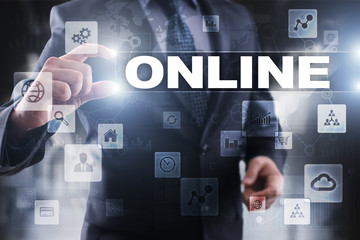 Businessman selecting online on virtual screen.