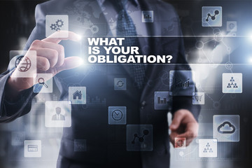 Businessman selecting what is your obligation on virtual screen.