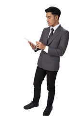 young asian startup entrepreneur businessman wearing gray suit using  digital tablet touchpad with touch pen over white background