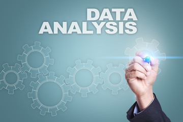 Businessman drawing on virtual screen. data analysis concept