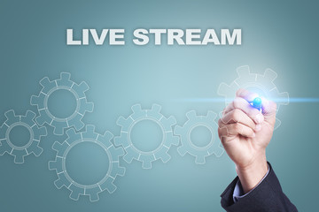 Businessman drawing on virtual screen. live stream concept