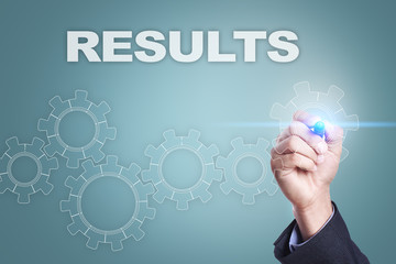 Businessman drawing on virtual screen. results concept