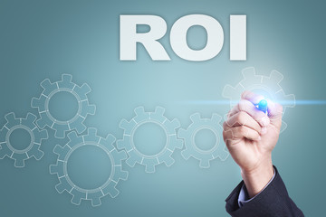 Businessman drawing on virtual screen. roi concept