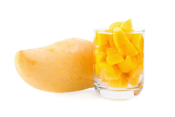 Mango fruit and mango cubes on the white background