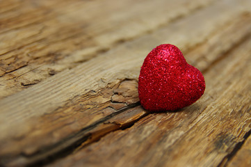 Red heart on wood