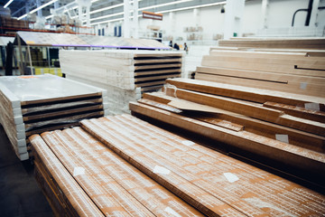 Building timber warehouse, logistics concept, construction of houses, loader.