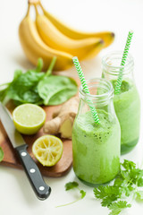 healthy green spinach smoothie with cilantro lime banana ginger