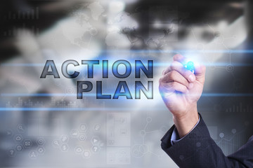 Businessman is drawing on virtual screen. action plan concept.