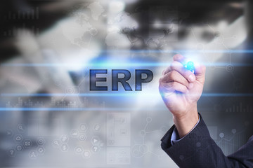 Businessman is drawing on virtual screen. erp concept.