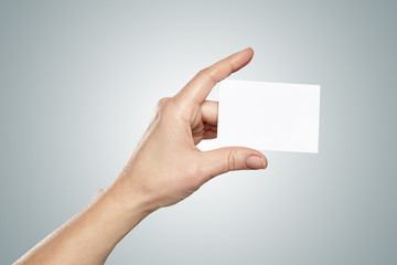 Woman hand holding a card