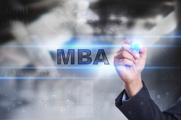 Businessman is drawing on virtual screen. mba concept.