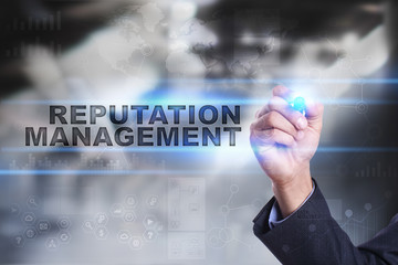 Businessman is drawing on virtual screen. reputation management concept.