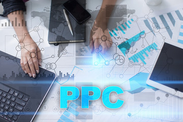 Woman working with documents, tablet pc and notebook and selecting ppc .