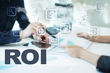 roi on virtual screen. Business, technology and internet concept.