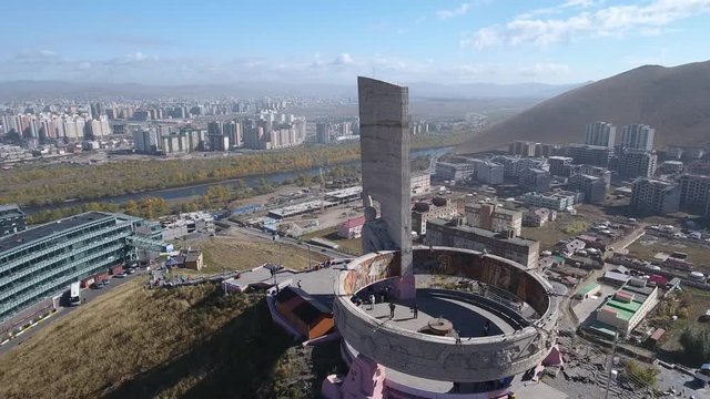 Zaisan Memorial monument USSR soldier with flag. Capital of Mongolia Ulaanbaatar observation deck. Tourist walk uphill mountains. Aerial Drone flight around 4k footage.