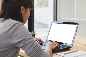 asian girl female teenager studying at school. Student typing on laptop computer - education and learning concept