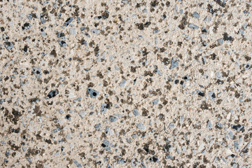 Abstract background - texture of rural asphalt road with raindrops