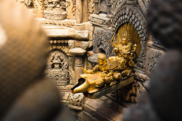 Tusha Hiti: A sunken water tank in Sundari Chowk, one of the many courtyards in Patan's Durbar Square.  The tank is thought to have been used as a bathing pool for the king. Kathmandu, Nepal.