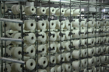 Spools of cotton thread. A textile factory