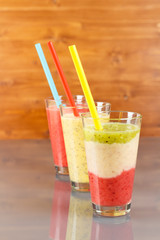 3 different smoothies with straws, low focus,