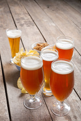 glass beer on wood background