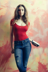 Fototapeta premium Pretty girl or beautiful painter with spray paint bottle