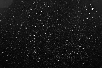 snow on a black background texture overlay bokeh highlights