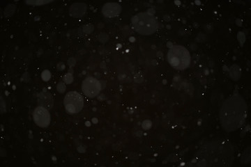 snow on a black background texture overlay bokeh highlights