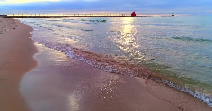 Beautiful waves lapping the sandy shores, gentile, eternal, ethereal.
