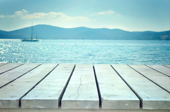 Wooden planks with sea © mythja