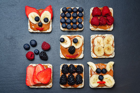 Variation of healthy peanut butter breakfast Breads with berries and banana