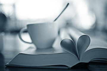 heart from pages of the book concept love tea coffee