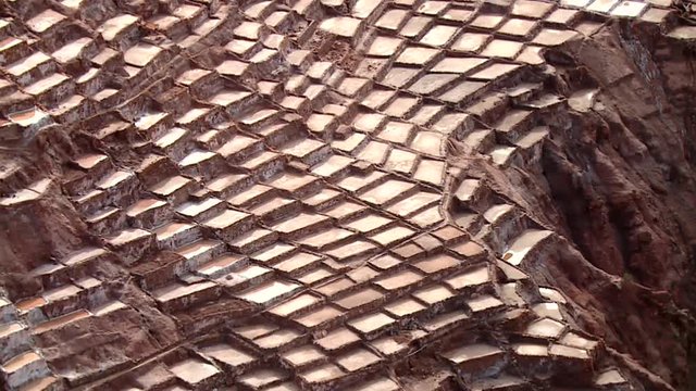 PERU: Salt evaporation pond in Maras. HD Video footage from the Andes of Peru, South America