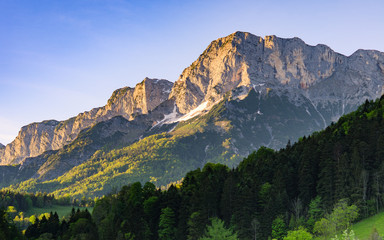 Alpine morning sunlit scenery in national park Berchtesgaden