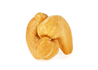 Roasted cashew nuts isolated on a white background, close up