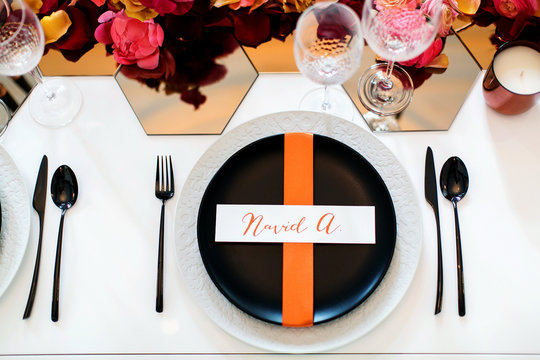 black & white plates and cutlery