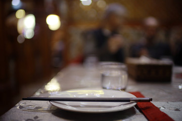serving in eastern restaurant, sushi