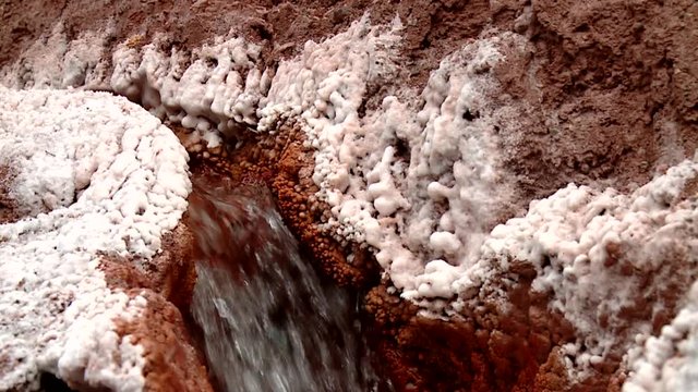 PERU: Salt evaporation pond in Maras. Video footage from South America, Peru. Close-up