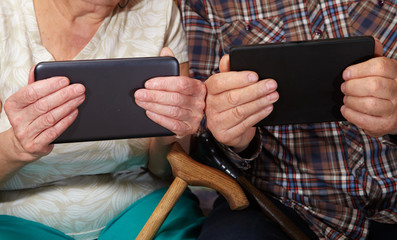 Old couple and tablet