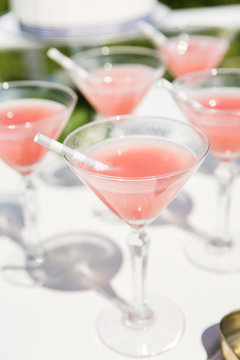 pink cocktail in round glass
