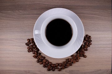 Coffee cup with coffee beans