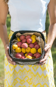 woman holding handmade vegan food