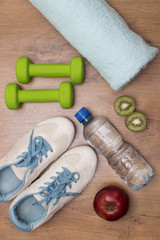 Fototapeta na wymiar fitness equipment and healthy food