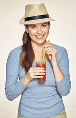 smiling woman holding red juice glass with straw