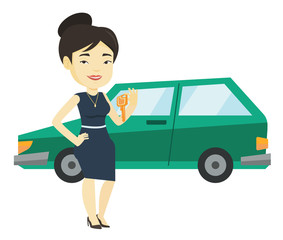 Woman holding keys to her new car.