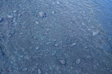 Stones on bottom of mountain river