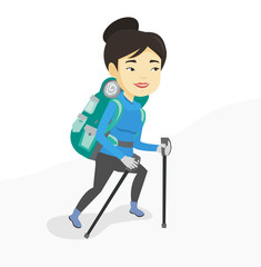 Young mountaneer climbing a snowy ridge.